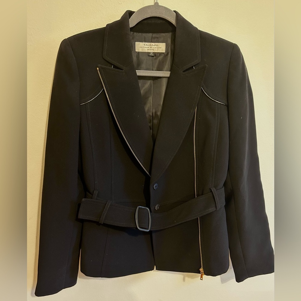 Tahari black jacket with gold zipper and button detail. Comes with a belt.